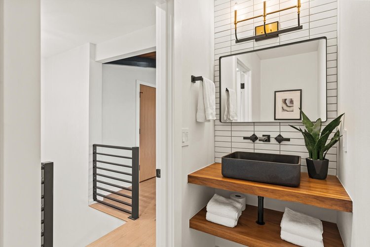 Cedar powder room with vessel sink