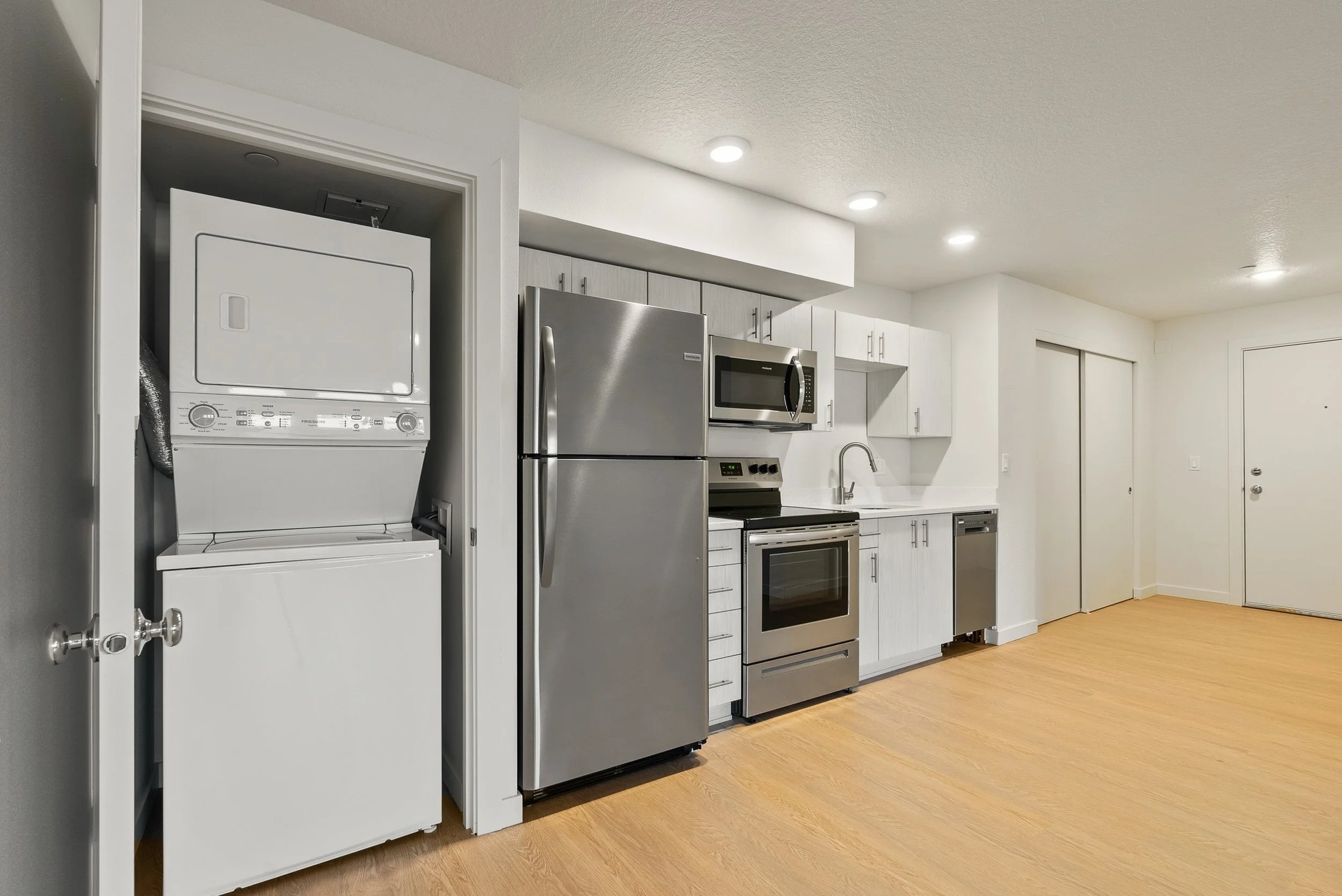 Duke Henry Flats kitchen with laundry