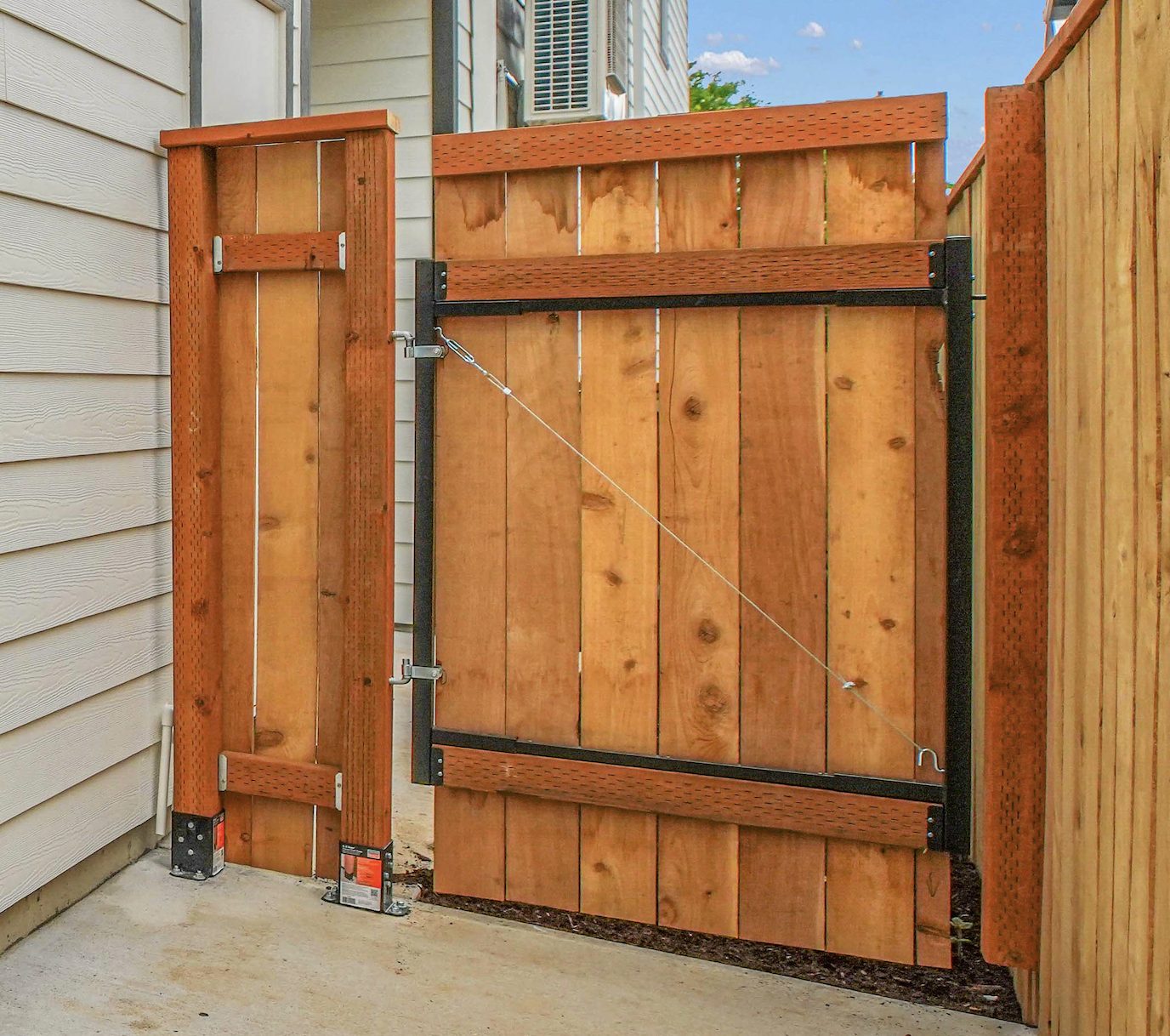Custom cedar gate with metal hardware