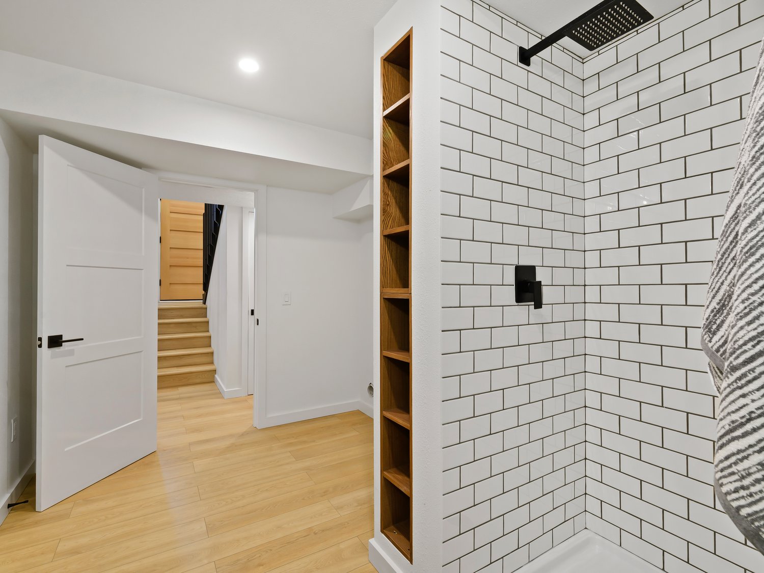 Walk-in shower with subway tile